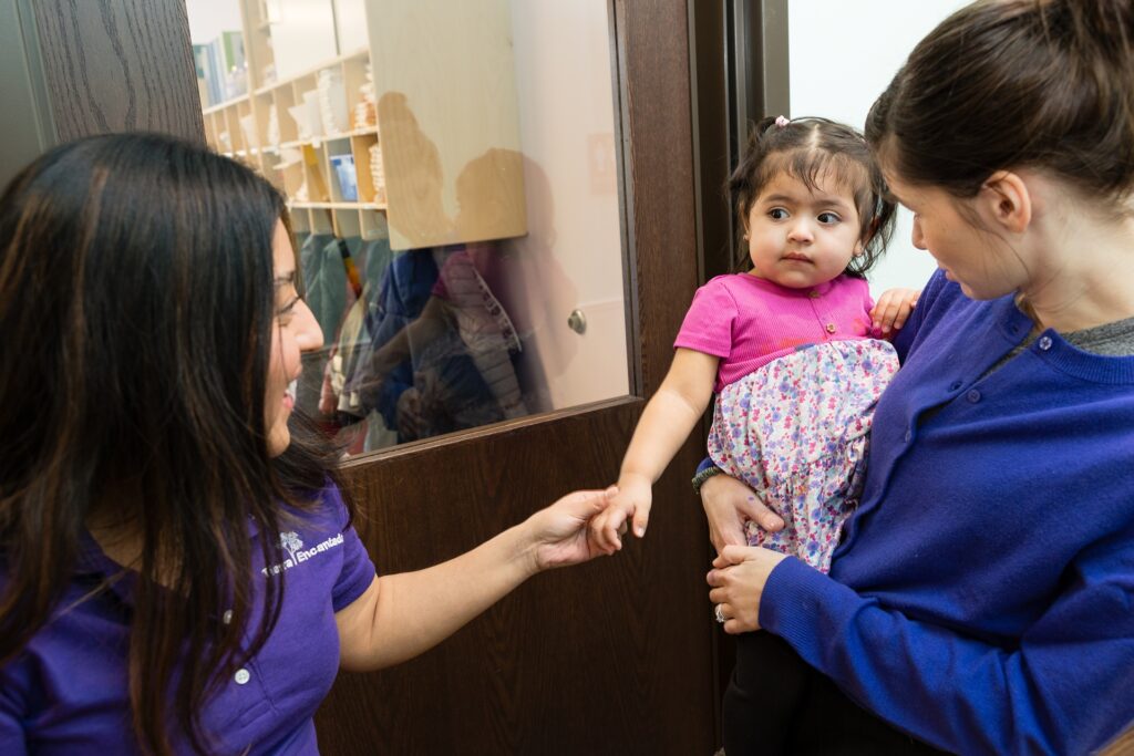 toddler parent touring a Tierra Encantada daycare franchise